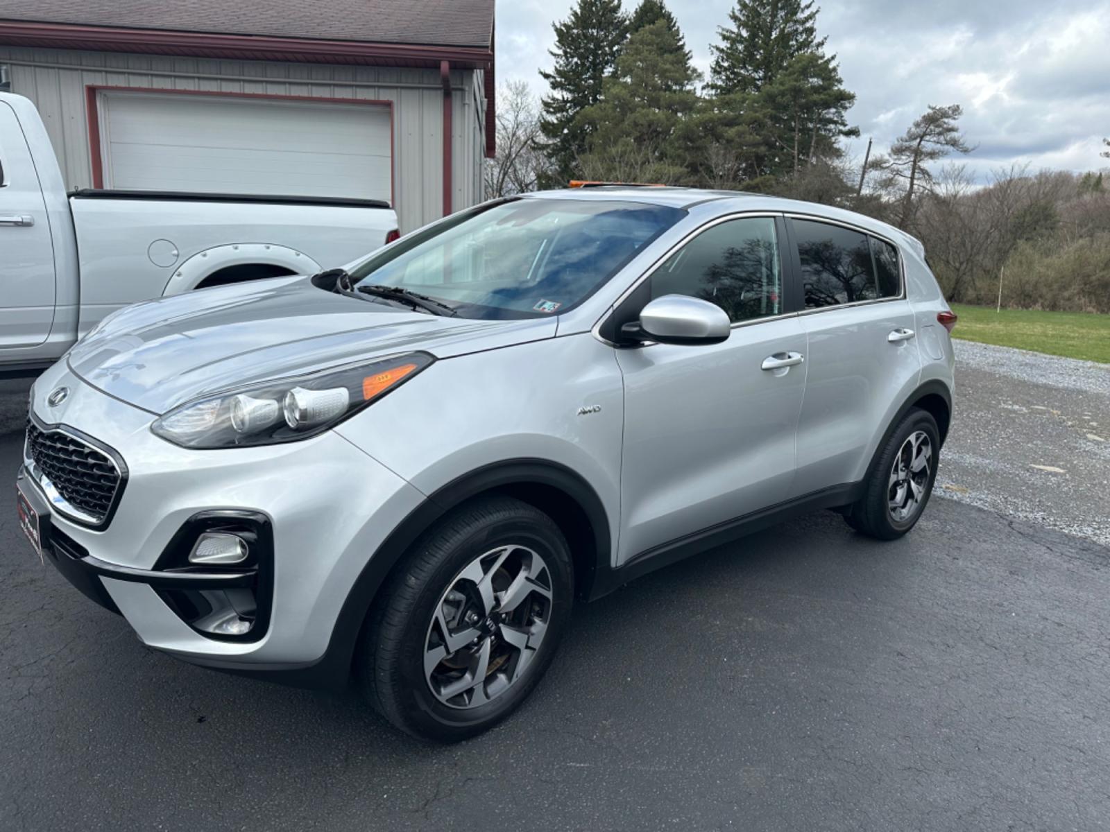 2021 Silver Kia Sportage (KNDPMCAC8M7) with an 4 engine, automatic transmission, located at 8464 Route 219, Brockway, PA, 15824, (814) 265-1330, 41.226871, -78.780518 - Like new without the new price 2021 Kia Sportage LX AWD with 4 cylinder engine, air condition, power windows and locks, factory alloys and ONLY 21700 miles! Serviced and remaining factory warranty. - Photo #0
